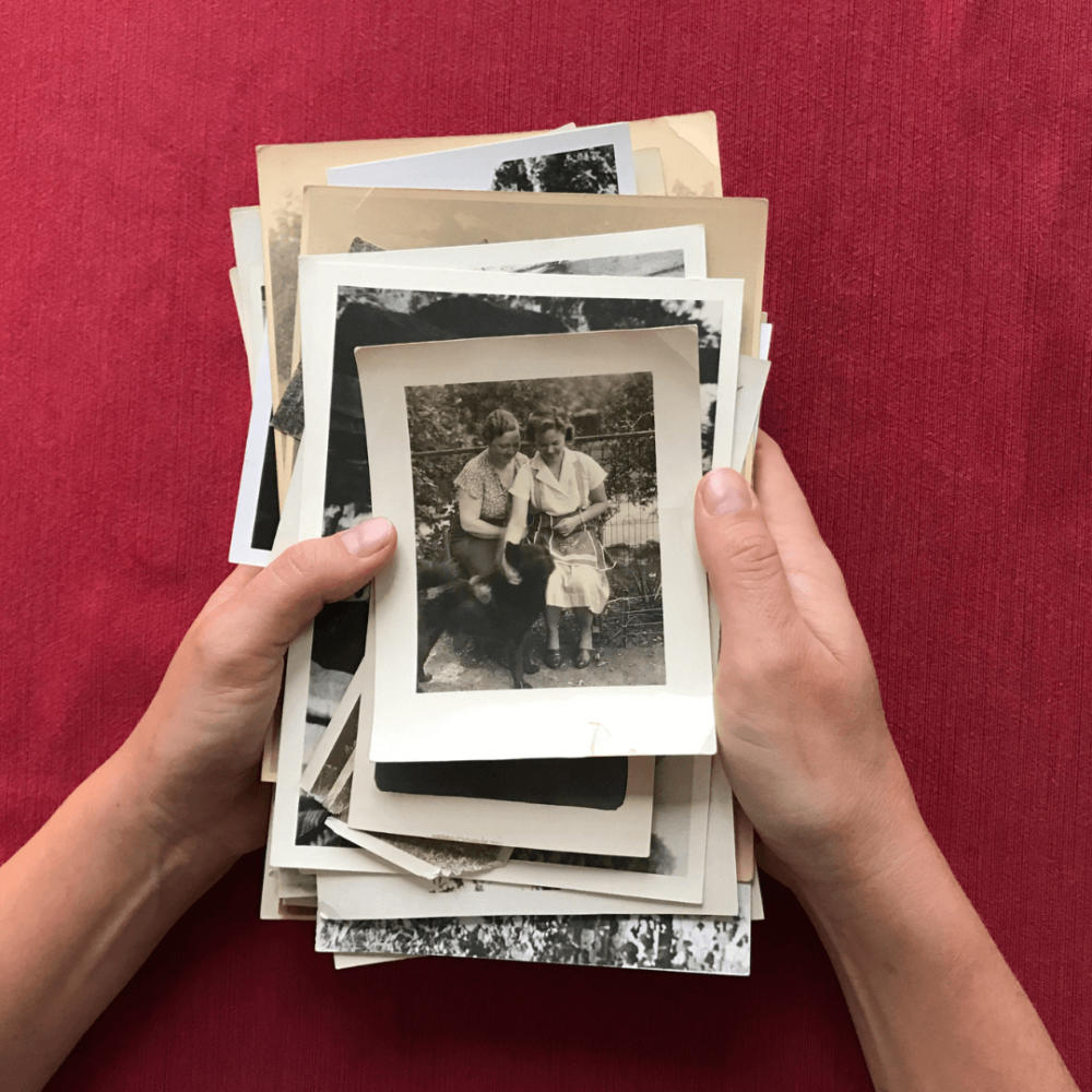 Holding+old+photographs+[canva] (1)
